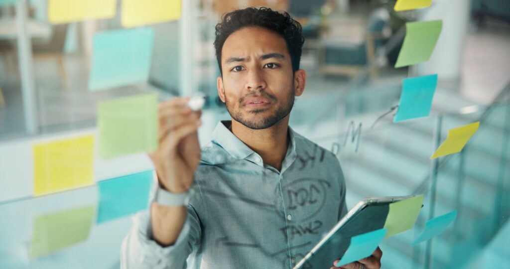 how to map business workflows — business owner mapping actual workflow on whiteboard versus org chart