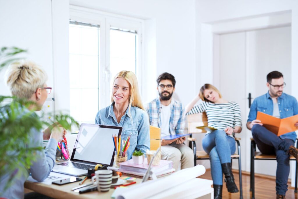 decision making bottleneck small business — leadership team waiting for owner approval in meeting